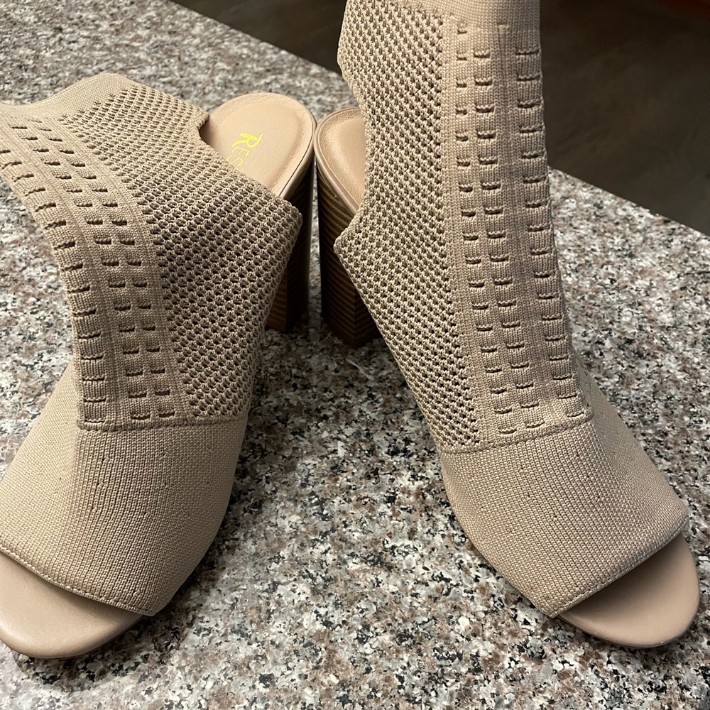 Beige “Restricted “ high heel shoes.  Never worn.